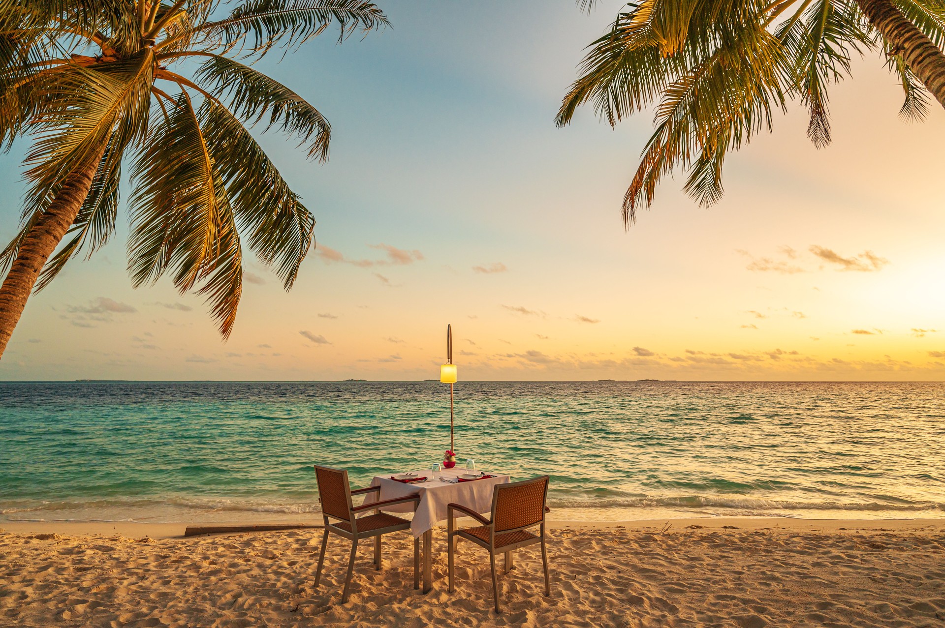Romantic sunset dinner on the tropical paradise beach